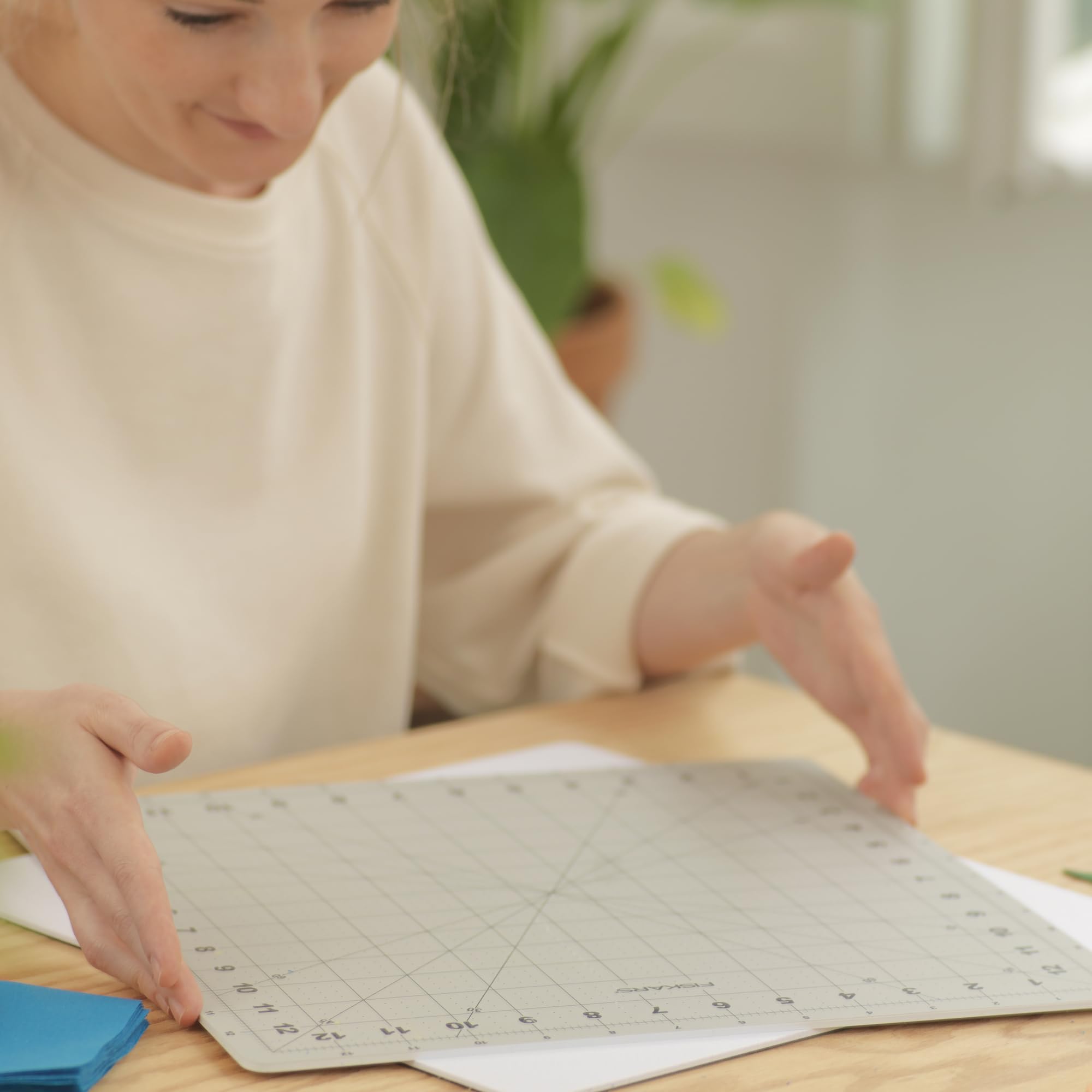 Fiskars Rotating Cutting Mat - 14" x 14" Grid to Cut Fabric Squares Easily - Perfect for Quilting, Sewing and Craft Projects - Self-Healing Mat - Gray